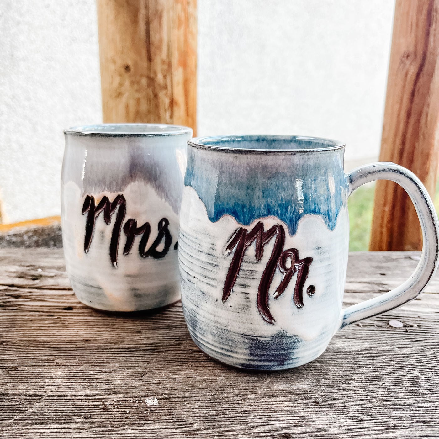 A matched pair of wedding mugs